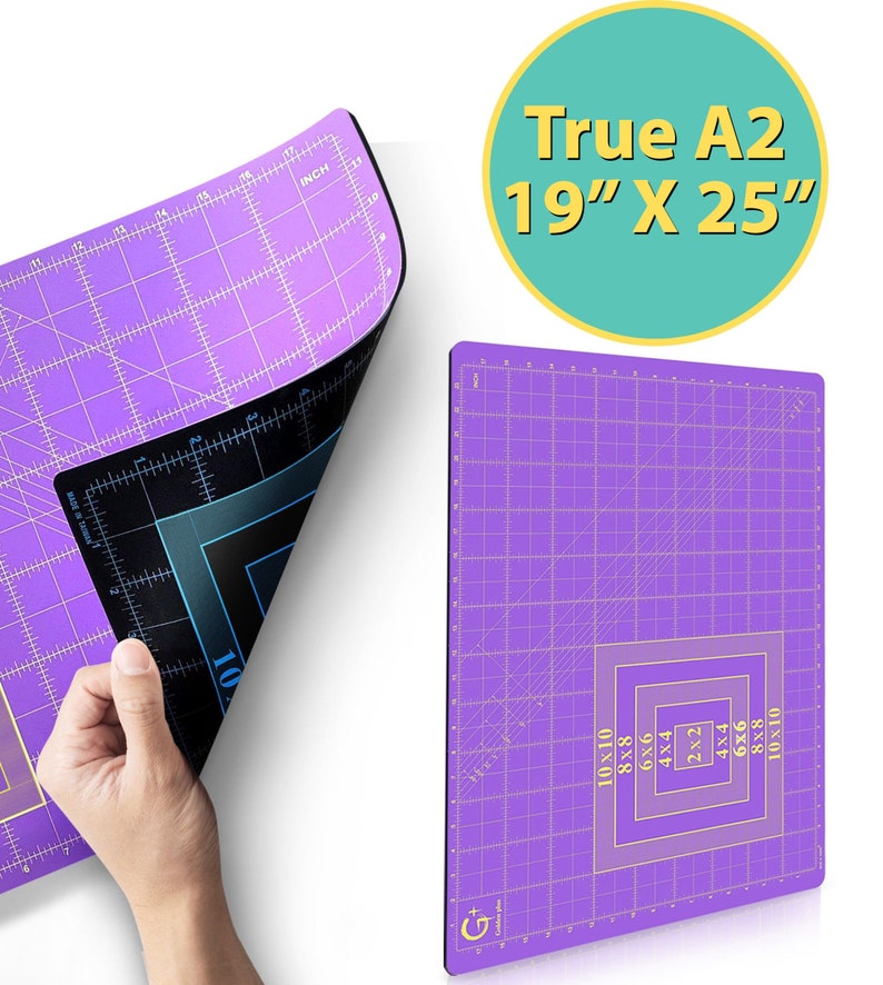 May include: A purple self-healing cutting mat with a grid pattern and gold markings. The mat is 19 inches by 25 inches and is labeled "True A2".