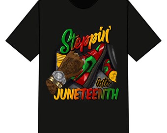 May include: Black t-shirt with a graphic design of a red, green, and yellow sneaker with the text "Steppin' into Juneteenth" in a colorful font.