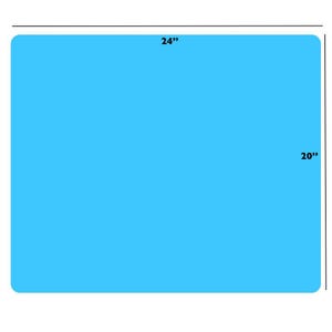 May include: A rectangular light blue mat with rounded corners. The dimensions are clearly indicated by black lines and text, showing a width of 61 cm and a height of 51 cm. The surface is a solid, uniform shade of bright sky blue.