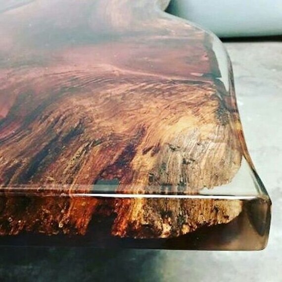 Wall text: Do you have Magic Resin Table Top & Art Epoxy Resin