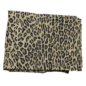 May include: A brown and black leopard print fabric with a subtle sheen. The fabric is folded in half and has a slightly textured surface.