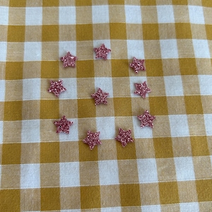 10 mini adesivi termoadesivi a forma di stella in rosa