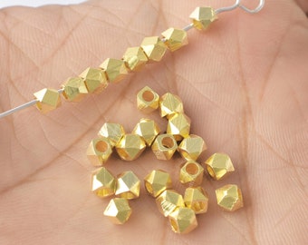 Cuentas espaciadoras facetadas chapadas en oro de 4 mm con corte de diamante para joyería (100 unidades)