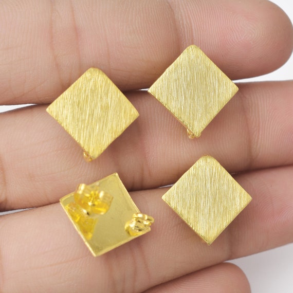 Pair of Brushed Brass Triangle Stud Earrings Pair of Brushed Brass Triangle Stud Earrings