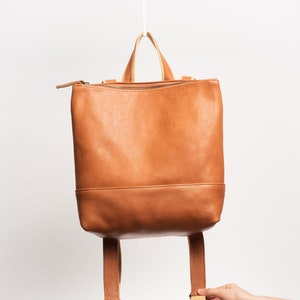 Full grain leather backpack. Top grain leather. Vegetable tanned leather.