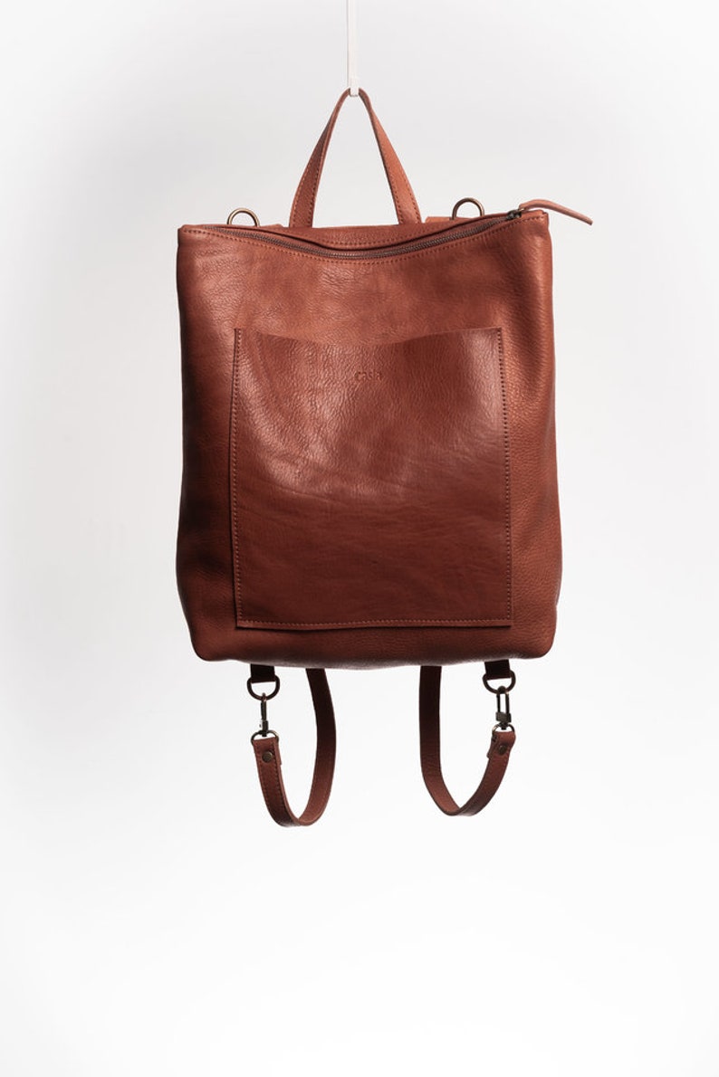 Full grain leather convertible backpack.