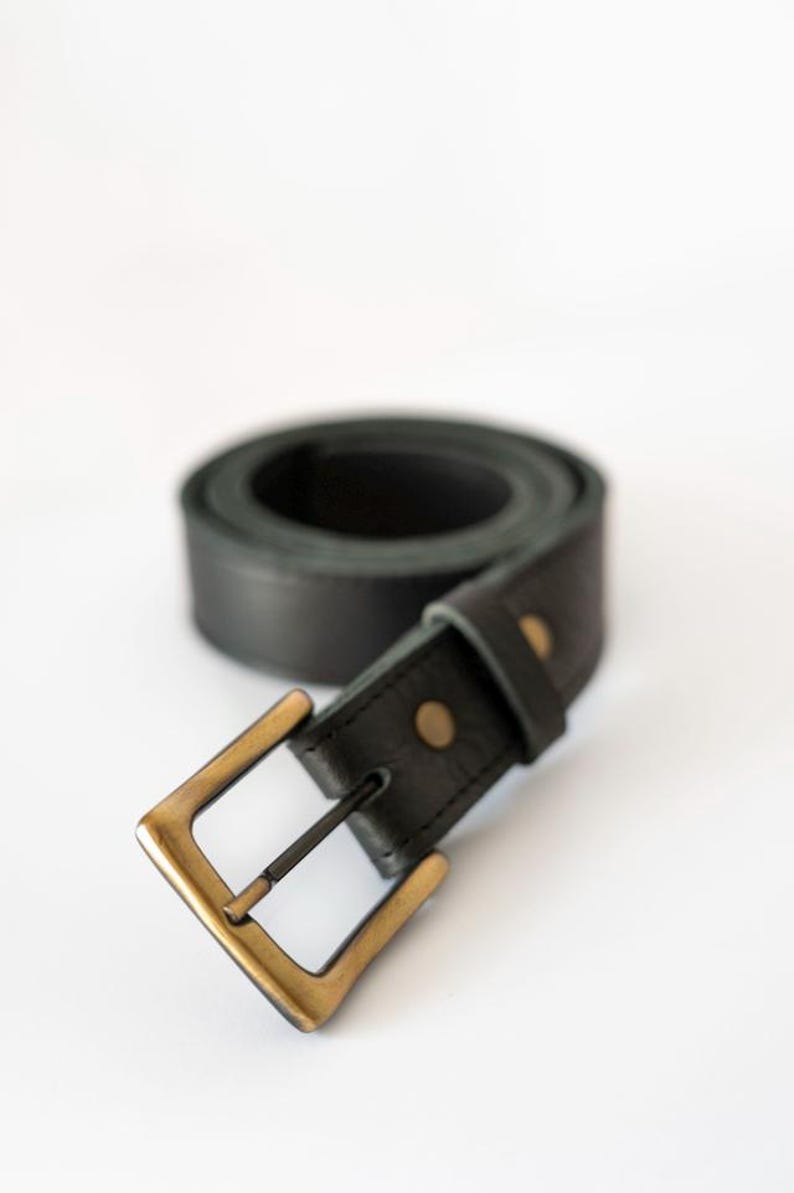 Leather Belt - Leather Men Belt - Classic Leather Belt 35mm - Leather Women  Belt - Metal Buckle Leather Belt - A black leather belt with a brass buckle. The belt is rolled up and the buckle is facing the camera.
