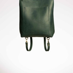 Full grain leather convertible backpack.
