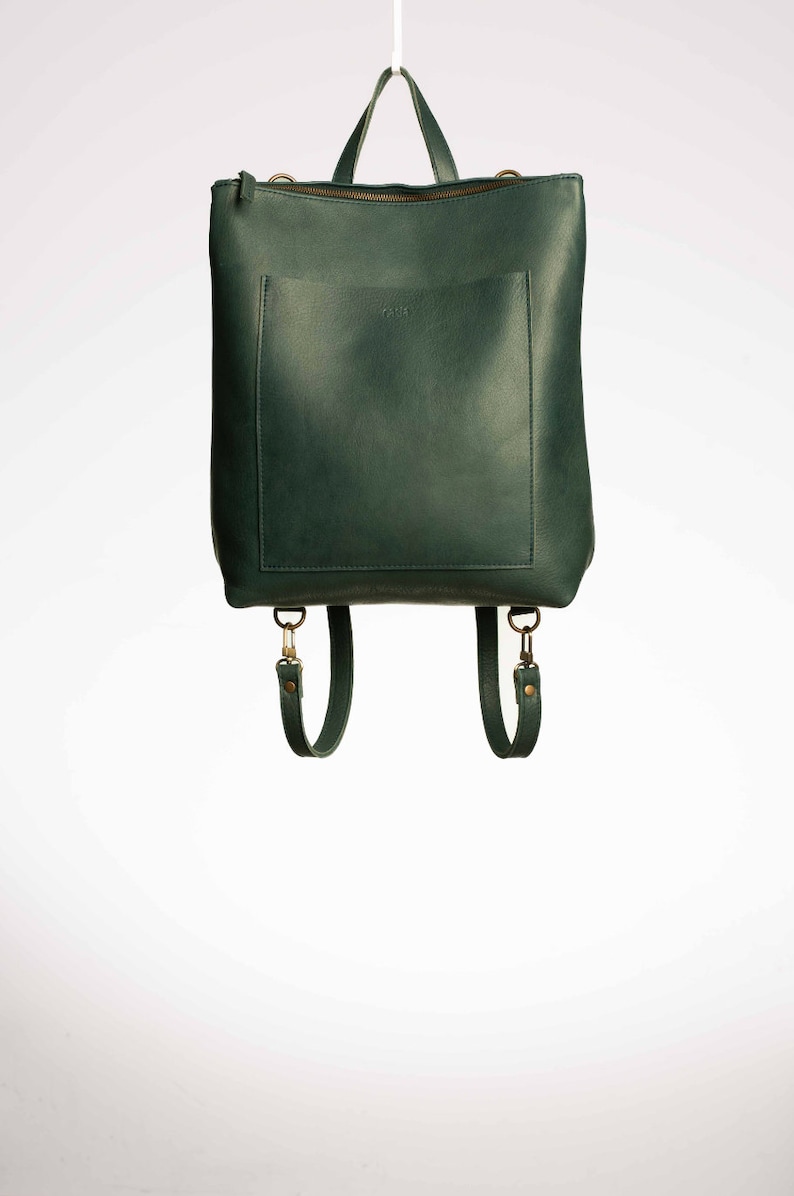 Full grain leather convertible backpack.