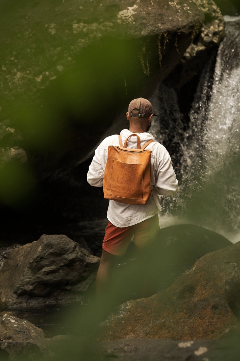 Full grain leather convertible backpack.