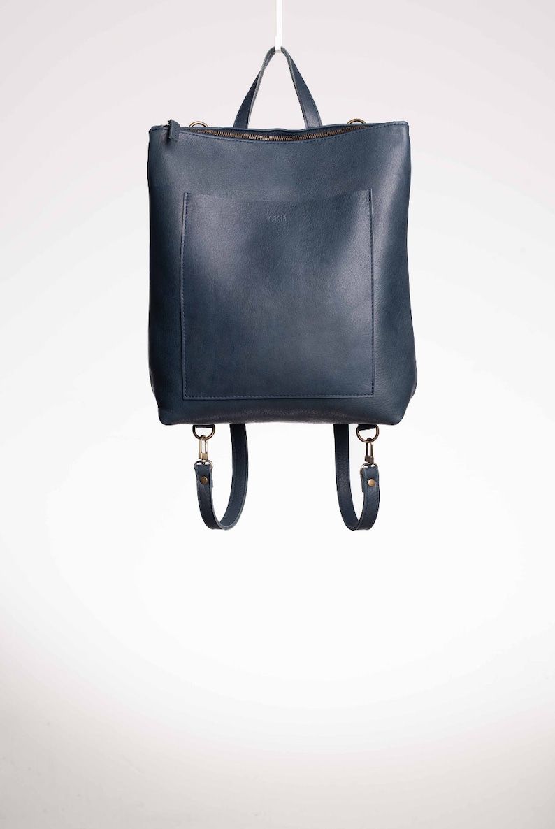 Full grain leather convertible backpack.