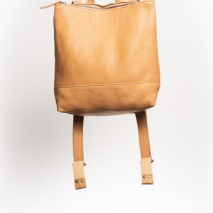 Full grain leather backpack. Top grain leather. Vegetable tanned leather.