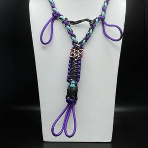 Dark Knight/Acid Purple/Glow Turquoise with Rose Gold atom charm  (Knight and Glow colors are “premium”)