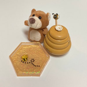 Yellow Hexagon Coasters: Handmade Resin Art with Bee Accents