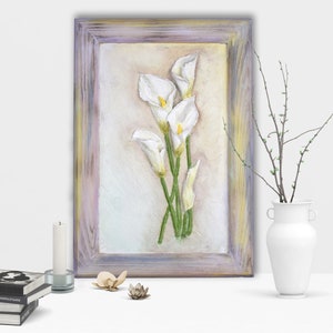 Lovely calla bouquet on a wooden board.Perfect gift favorite