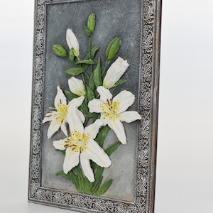 Bouquet of white liles on Wood