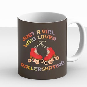 May include: A brown ceramic mug with a white handle. The mug has a graphic of a pair of roller skates with the text "Just a girl who loves rollerskating" in rainbow colors.
