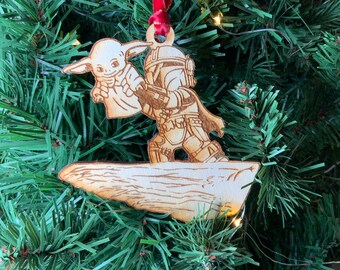 Mando with baby green alien inspired wooden ornament