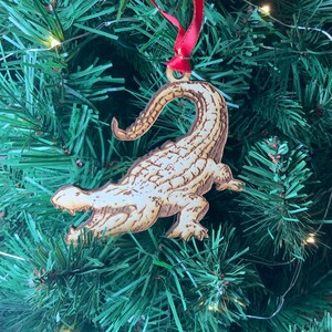 Crocodile inspired wooden ornament