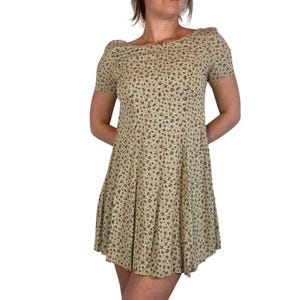 dark brown patterned scoop neck babydoll dress with quarter sleeves Samana Babydoll Mini Dress in Check Dark Brown