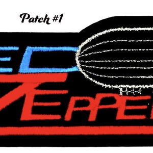 Puede incluir: Parche bordado en negro y rojo con el texto "LED ZEPPELIN" y un contorno blanco de un dirigible. El texto "Patch #1" está en la esquina superior izquierda.