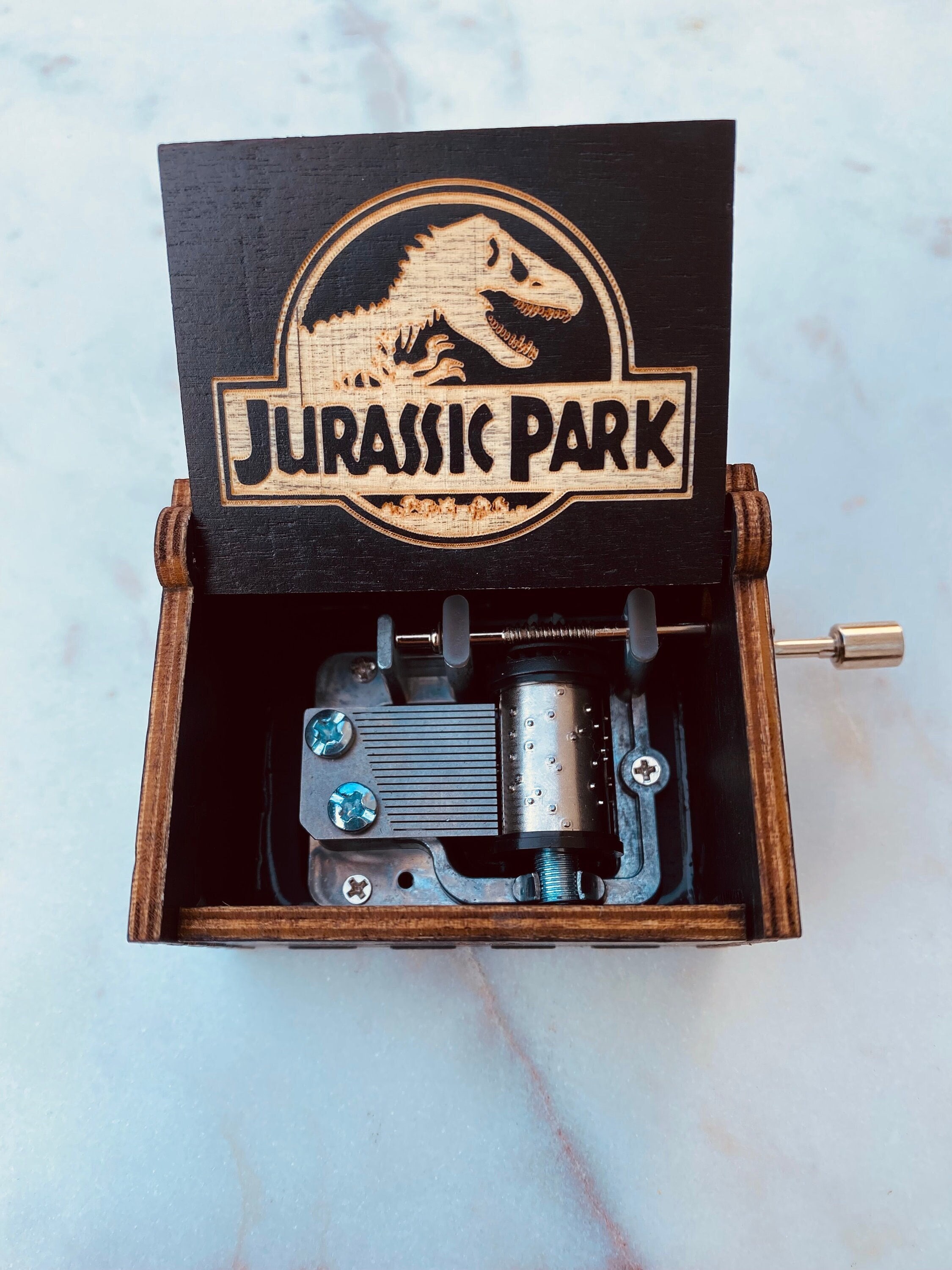 Jurassic park music box deals