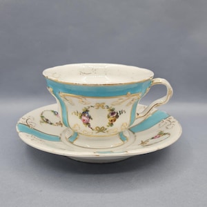 Antique English Cauldon & Minton porcelain teacup and saucer with finely hand-painted floral decoration, Tea Time, circa 1900