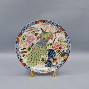 Small decorative plate, in Japanese porcelain, decoration of a couple of peacocks, cup, pocket, showcase object, 1980s