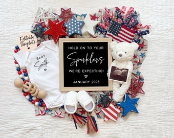 May include: A pregnancy announcement with a chalkboard sign that reads "Hold on to your sparklers, we're expecting! January 2025". The sign is surrounded by red, white, and blue stars, a teddy bear holding an ultrasound image, a baby onesie, and a pair of baby booties.