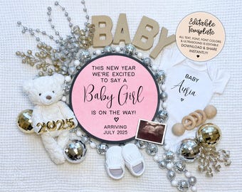 May include: A pink and white round sign with the text "This new year we're excited to say a Baby Girl is on the way! Arriving July 2025". A white onesie with the text "Baby Auria" is next to the sign. A white teddy bear with gold 2025 numbers is in the bottom left corner.