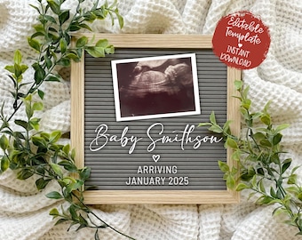 May include: A gray letter board with a white frame. The board has a black and white ultrasound image, the text "Baby Smithson" with a heart symbol, and the text "Arriving January 2025".