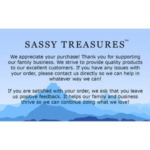 May include: A blue and white thank you card with the text "SASSY TREASURES&trade;" and a message expressing appreciation for purchases and encouraging positive feedback. The card features a stylized mountain range in the background.