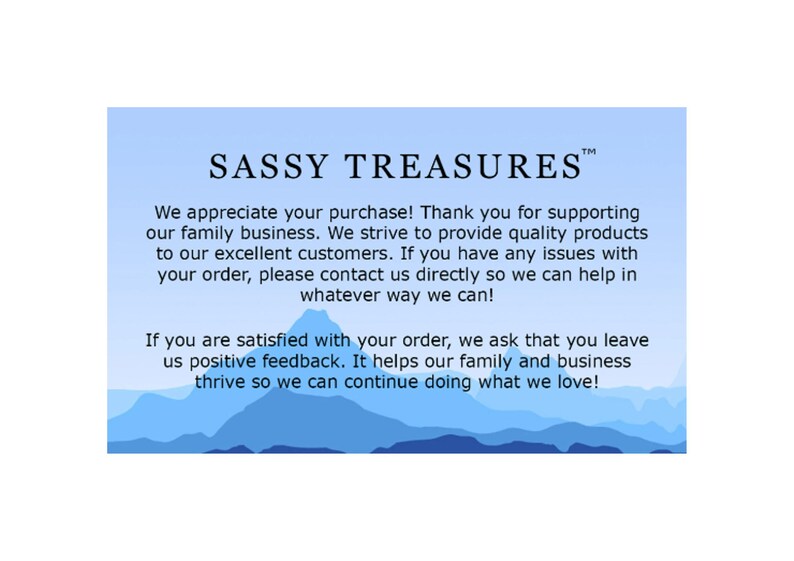 May include: A blue and white thank you card with the text "SASSY TREASURES&trade;" and a message expressing appreciation for purchases and encouraging positive feedback. The card features a stylized mountain range in the background.