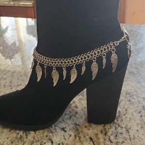 A Pair of Boot Jewelry, wings, Bling, Boot Bling. Decorate your favorite boots with this beautiful Boot Jewelry, Chains, spikes, jewelry