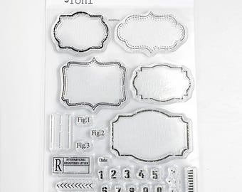 May include: Clear stamp sheet with various frame and label designs, including numbers 1-9, a date stamp, and a stamp that says "International Registered Letter".