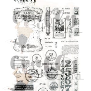 Peut inclure: Tampons transparents sur le thème de la mercerie. Comprend du texte comme "The Ladies Haberdashery Co. Est. 1897", des bobines, un mètre ruban et diverses étiquettes. Parfait pour le scrapbooking et l'artisanat.