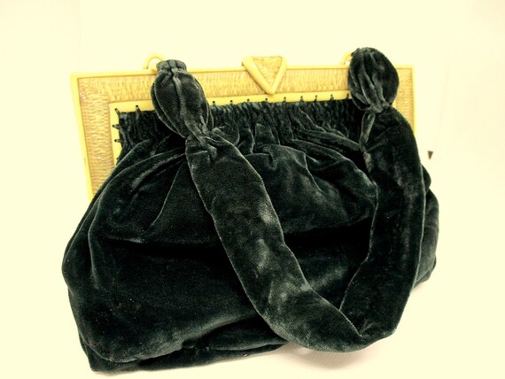 dark green velvet bag