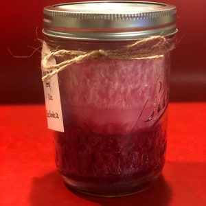 12 oz red coconut candle Each sold separately