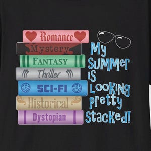 May include: A black t-shirt featuring a stack of seven colorful book spines labeled Romance, Mystery, Fantasy, Thriller, Sci-Fi, Historical, and Dystopian. To the right, blue text reads My Summer is Looking pretty Stacked! with white sunglasses above.
