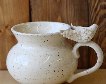 Speckled Ceramic Mug with bird sculpture