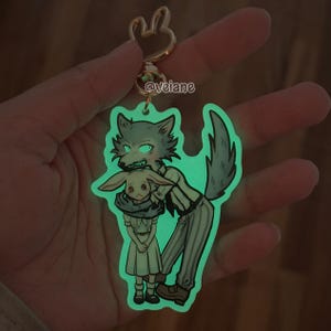 Legoshi and Haru from Beastars Glow in the dark double sided acrylic charm