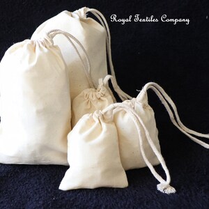May include: Four natural cotton drawstring bags of varying sizes, with the text "Royal Textiles Company" in the top right corner.