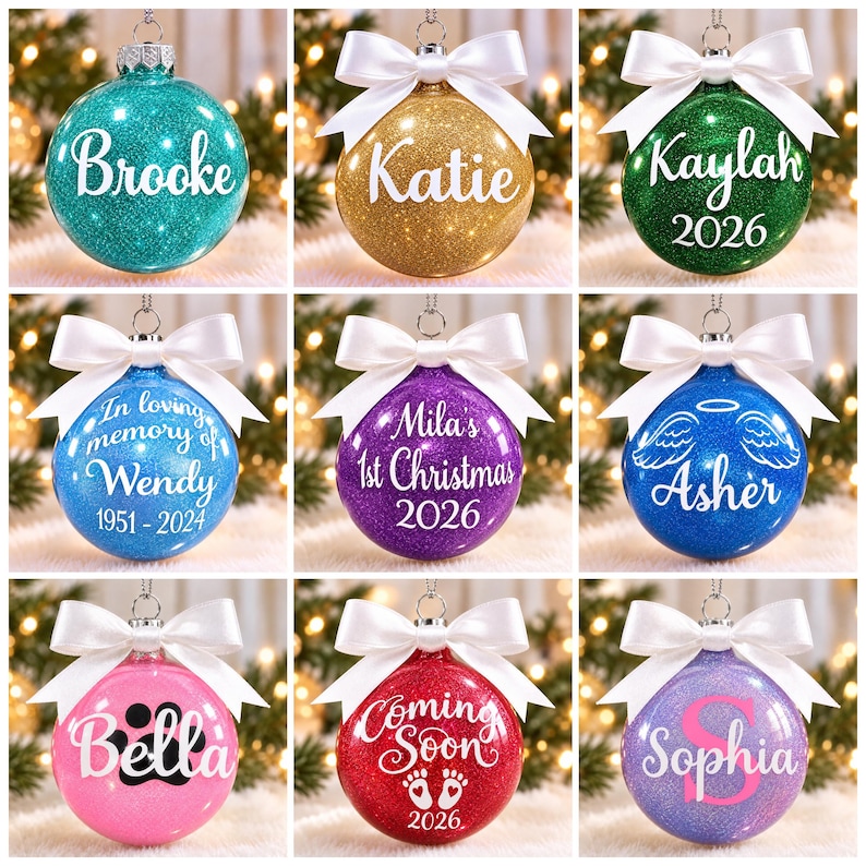 May include: A collection of nine round, glittery Christmas ornaments in various colors, each topped with a white satin bow. The ornaments feature personalized white text, including names like Brooke, Katie, Kaylah, Wendy, Mila, Asher, Bella, and Sophia, plus dates and graphics.