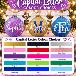 May include: Three round glittery Christmas ornaments in purple, gold, and blue, each topped with a white ribbon bow. The ornaments feature personalized names and large capital letters. A color chart displays fifteen options for the capital letter.