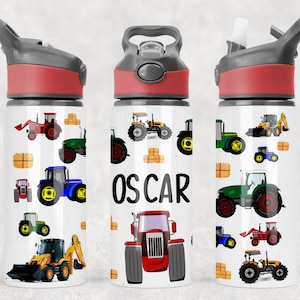 May include: A white drinks bottle with a red lid and a grey handle. The bottle features colourful illustrations of tractors, hay bales, and the name "OSCAR" in black letters.