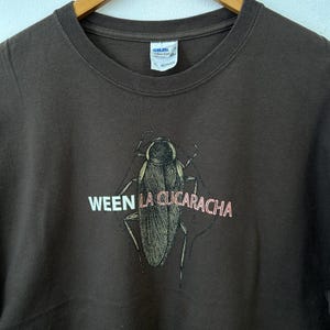 Camiseta vintage de los 2000 del álbum La cucaracha de WEEN, talla XL.