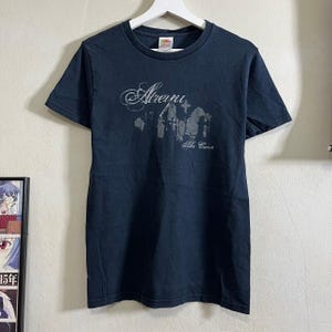 May include: Black t-shirt with a white graphic of a band called "Atreyu" and the text "The Curse".