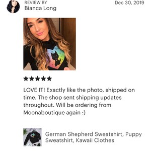 May include: Black sweatshirt with a rainbow heart and a black silhouette of a German Shepherd puppy inside the heart. The text "LOVE IT! Exactly like the photo, shipped on time. The shop sent shipping updates throughout. Will be ordering from Moonaboutique again :)" is below the image.