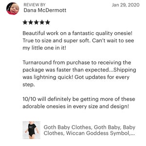 May include: A black onesie with white text that reads "Dark" on it. The onesie is shown on a white background. The text "Goth Baby Clothes, Goth Baby, Baby Clothes, Wiccan Goddess Symbol,..." is also visible in the image.