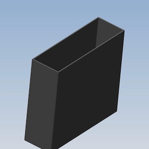 May include: A black rectangular container with an open top, set against a light blue background. The container has a simple, geometric design, with a slightly angled shape.